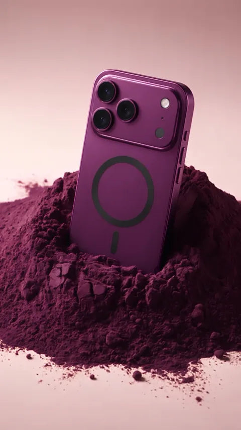 Burgundy magnetic phone case standing in matching powder.