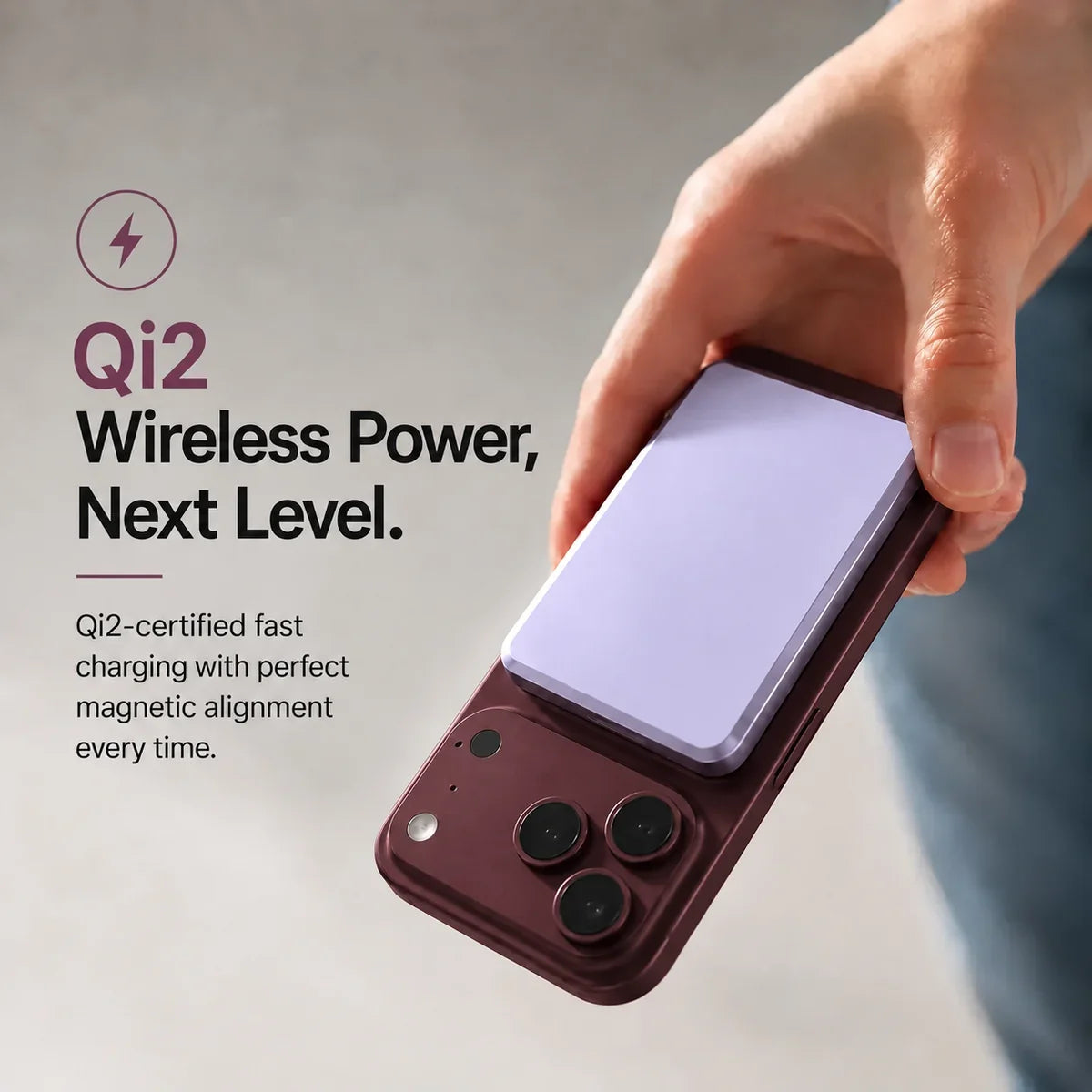 Lavender slim magnetic power bank attaching magnetically to a Burgundy phone. #color_Lavender