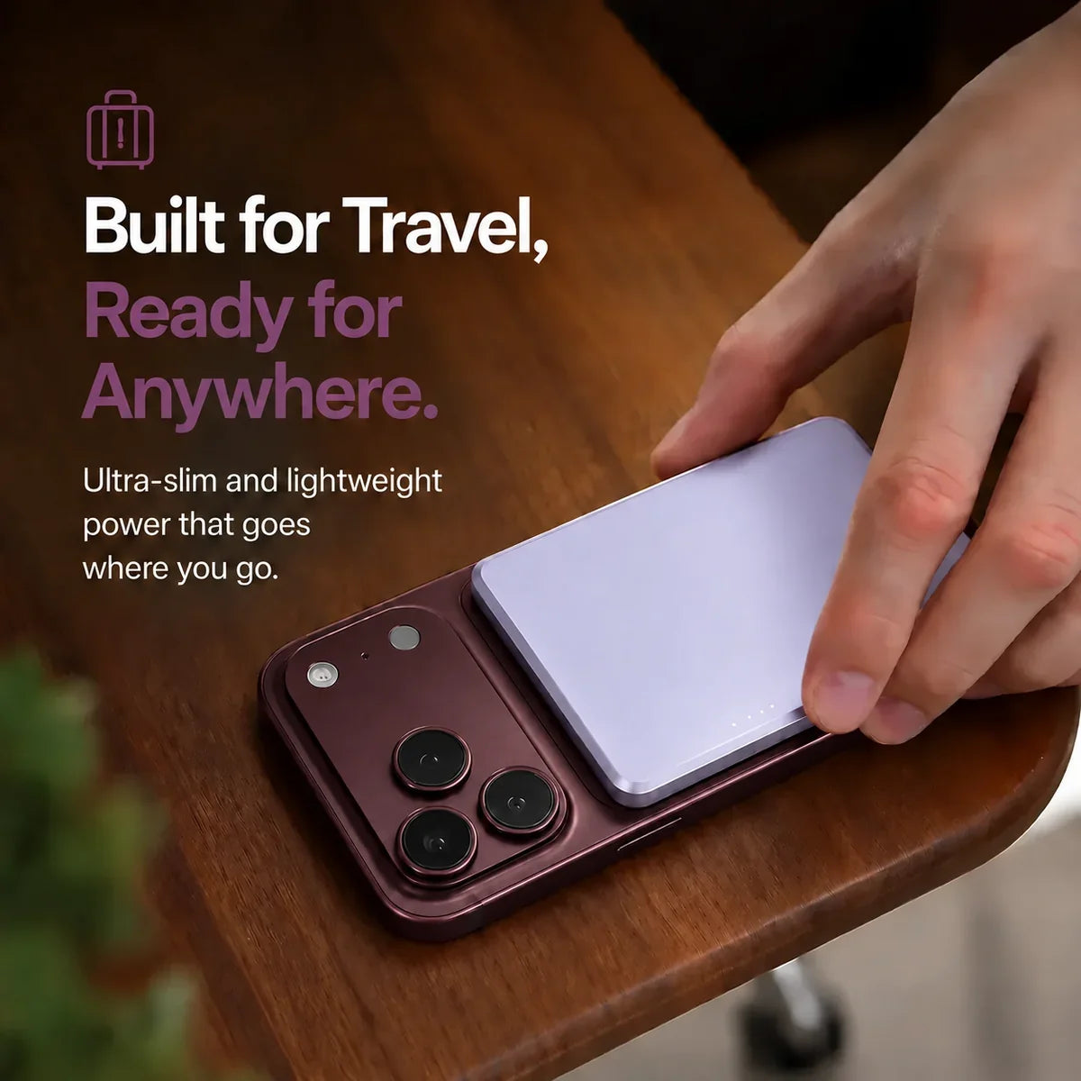 Lavender slim magnetic power bank being packed for travel. #color_Lavender