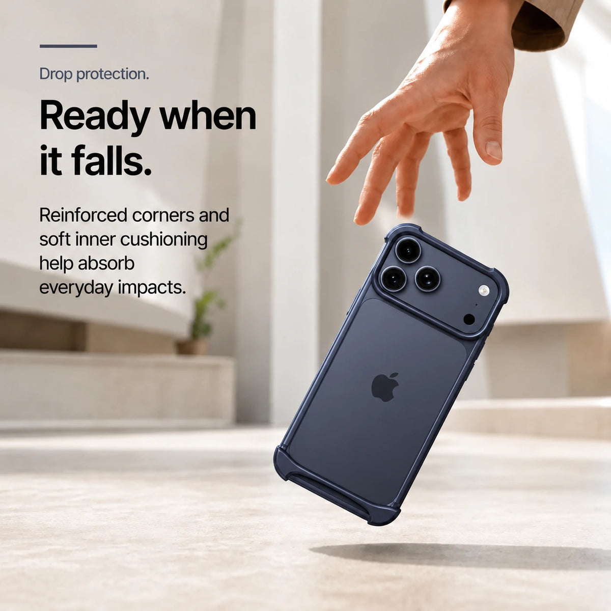 Navy blue open metal bumper phone case in a drop protection scene #color_Deep Blue