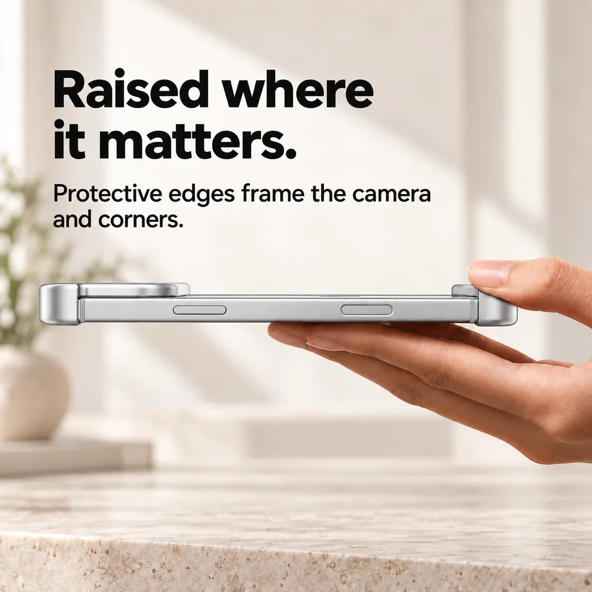 Silver metal phone bumper in a horizontal side view showing raised end protection #color_Titanium Silver