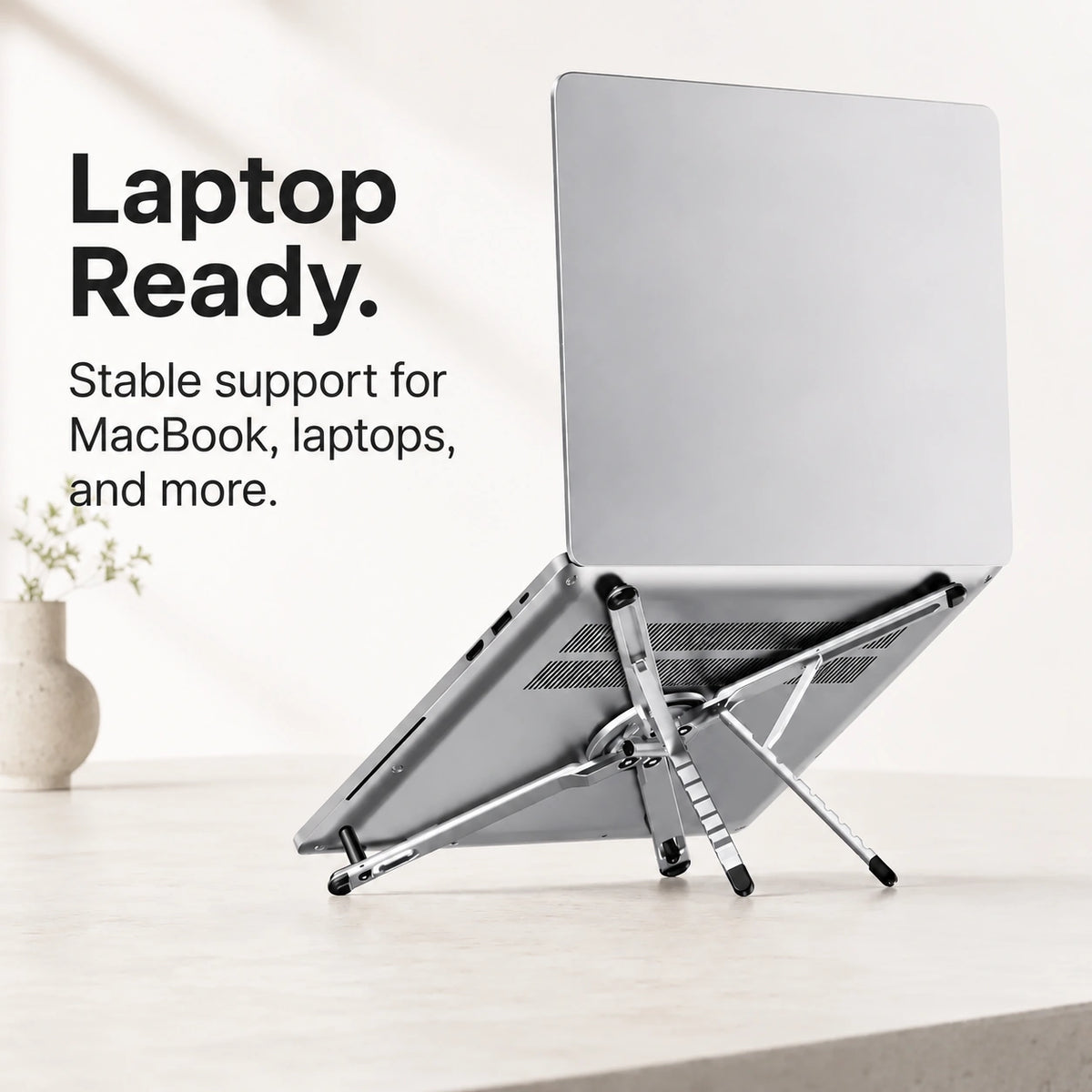 Titanium Silver folding magnetic device stand supporting a laptop #color_Titanium Silver