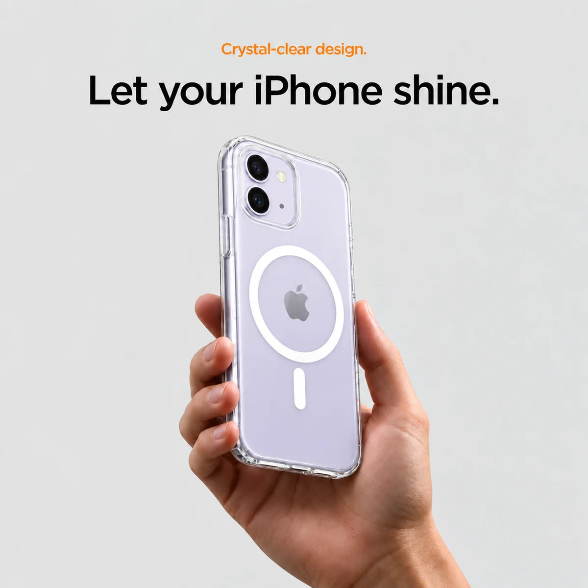 Clear magnetic phone case held at an angle, showing its transparent back and camera openings. #iPhone Model_iPhone 11