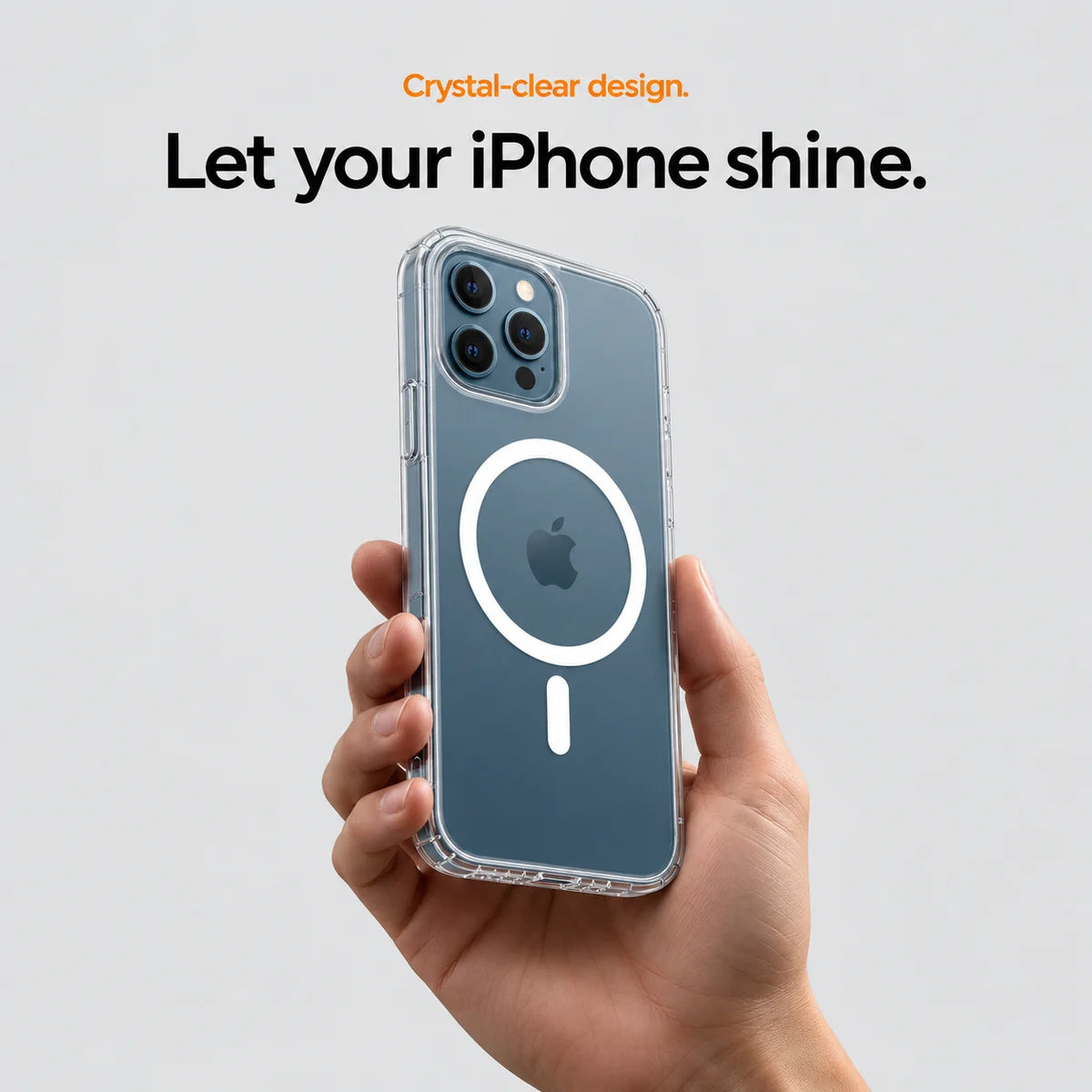 Clear magnetic phone case held at an angle, showing its transparent back and camera openings. #iPhone Model_iPhone 12 Pro Max