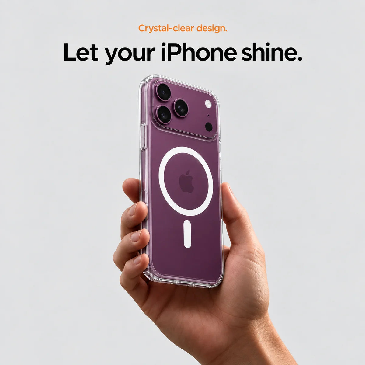 Clear magnetic phone case held at an angle, showing its transparent back and camera openings. #iPhone Model_iPhone 18 Pro Max