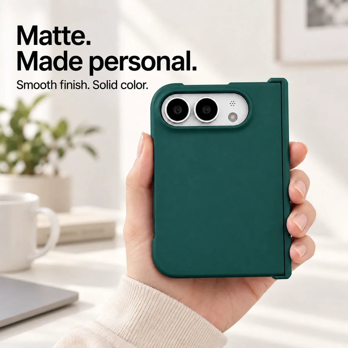 Army Green matte iPhone Ultra case held in one hand, with a smooth solid-color rear shell and silver camera area. #color_Alpine Green