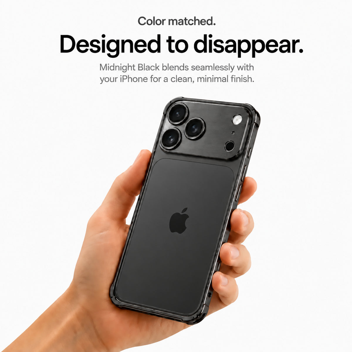 Black aluminum frame phone case held in a hand showing its open back #color_Midnight Black