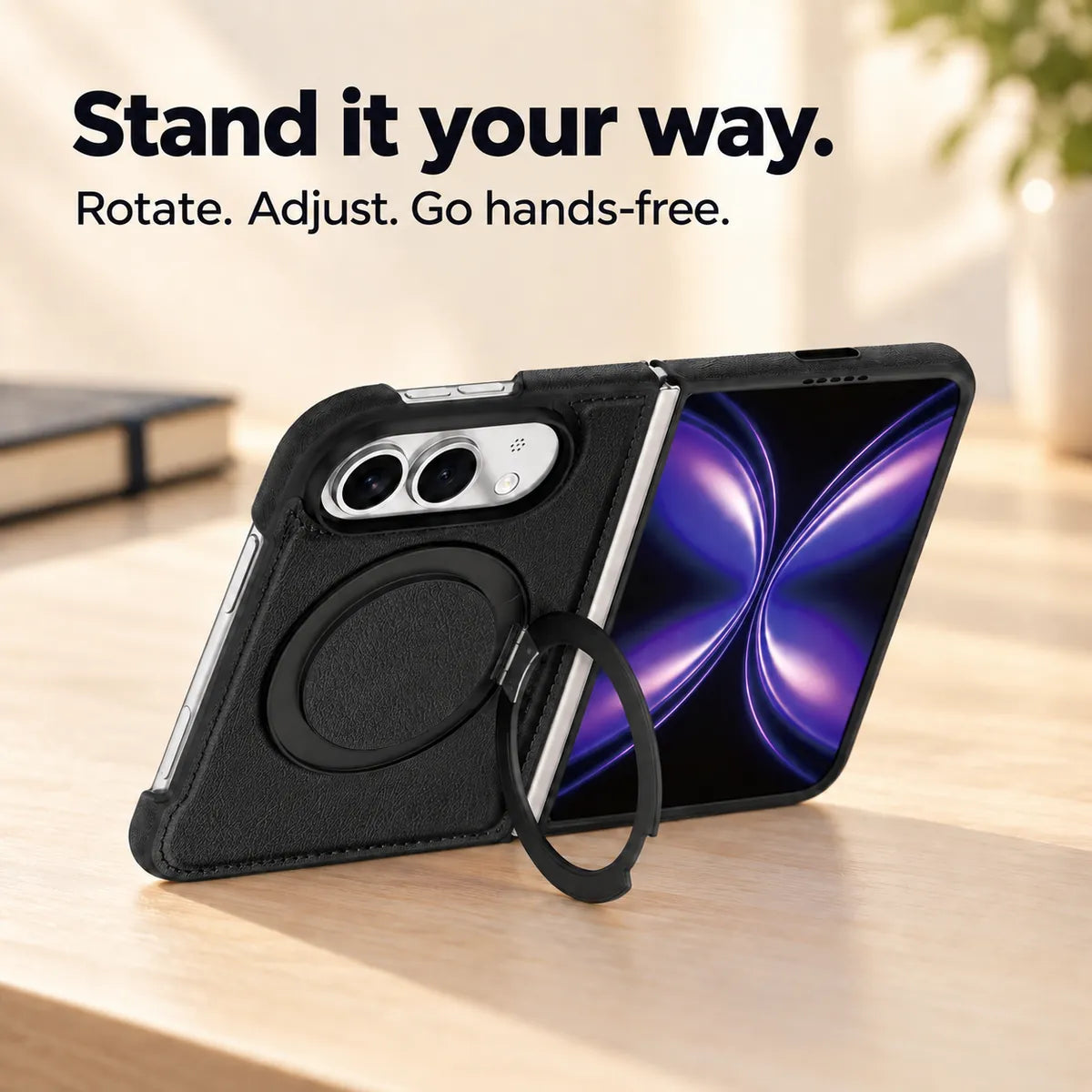 Textured synthetic leather folding phone case with its ring stand deployed on a desk. #color_Midnight Black
