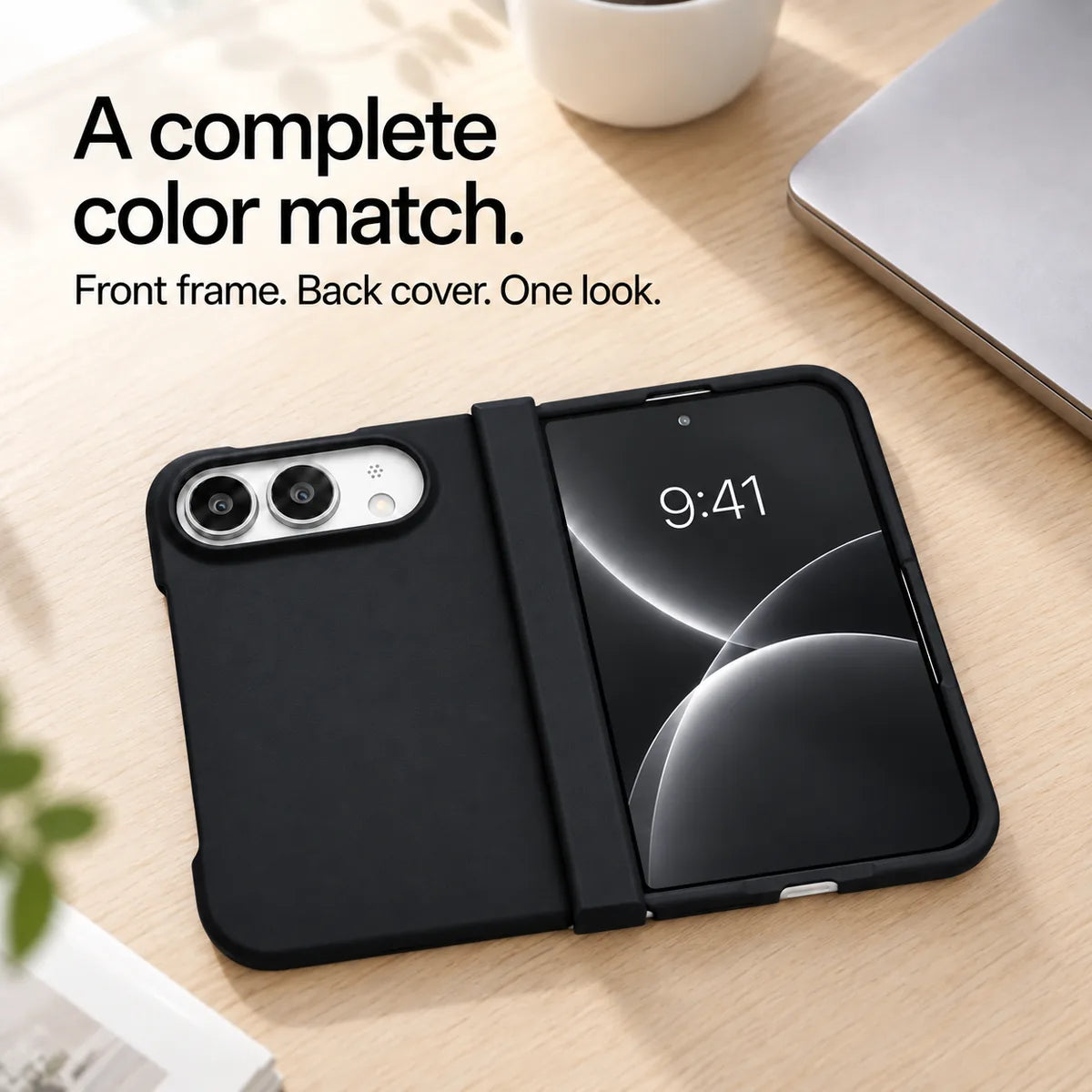 Black matte iPhone Ultra case open flat on a desk, showing coordinated front and back covers. #color_Onyx Black