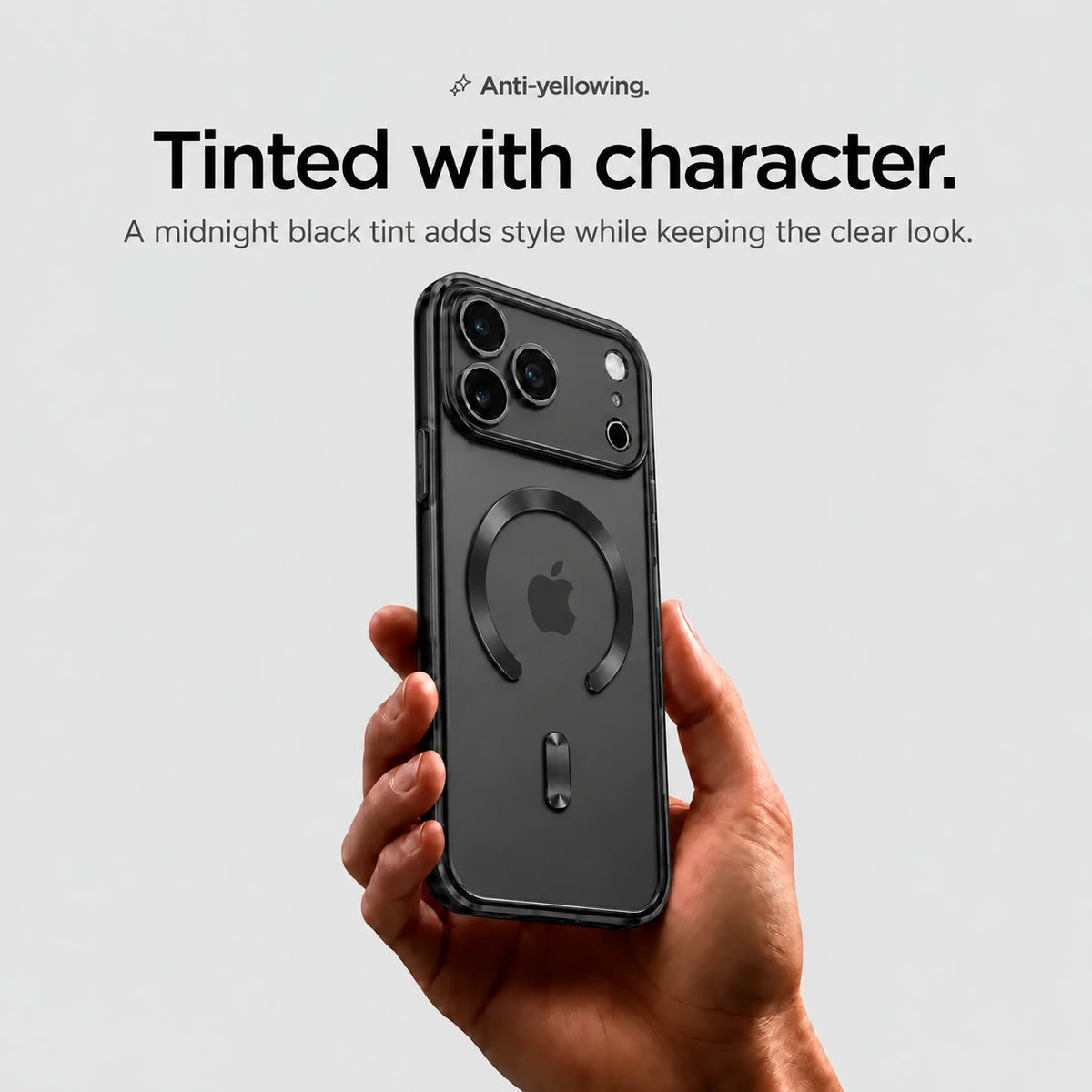 Black tinted magnetic phone case held upright in one hand #color_Midnight Black