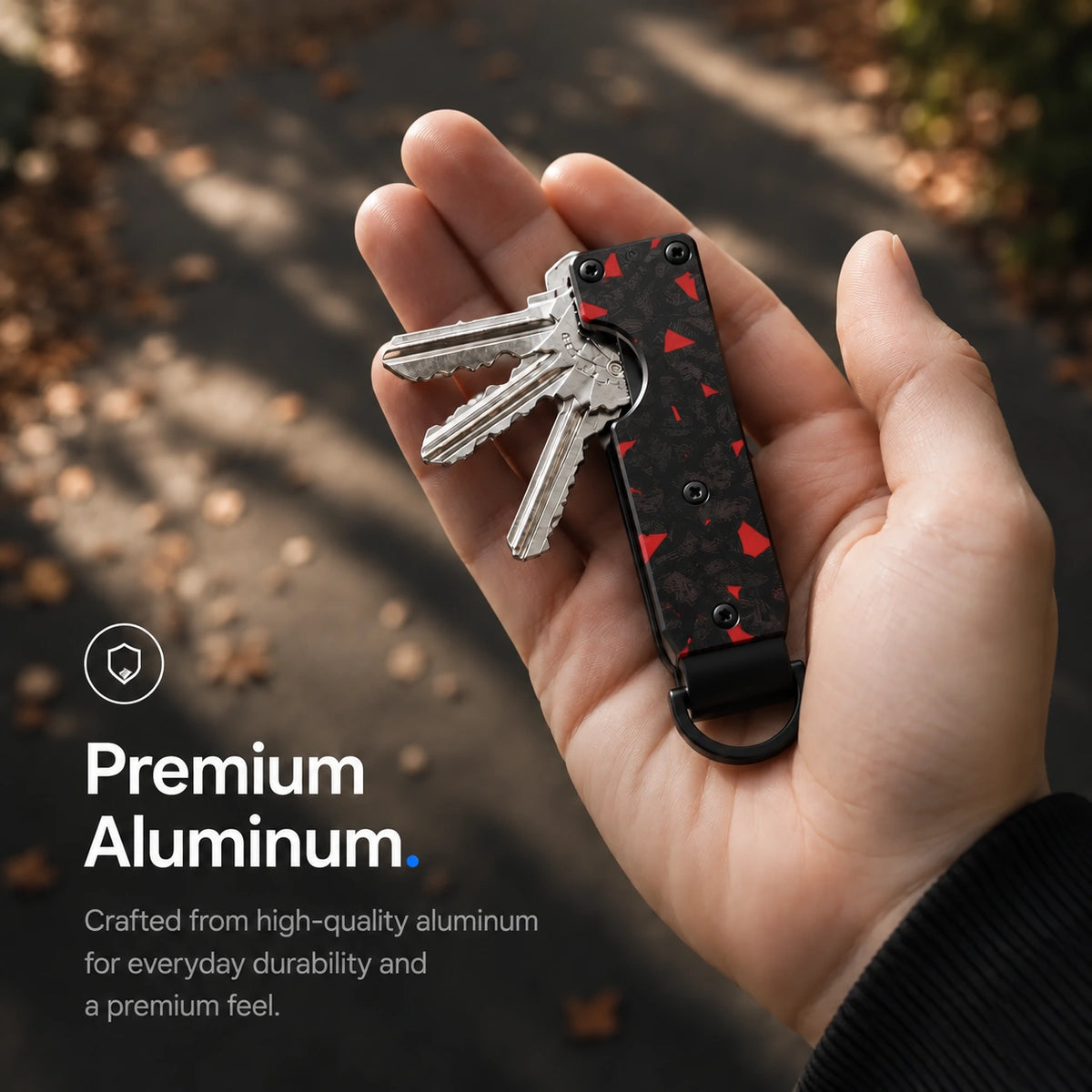 Carbon Red compact tracking key organizer showing the exterior finish #color_Carbon Red