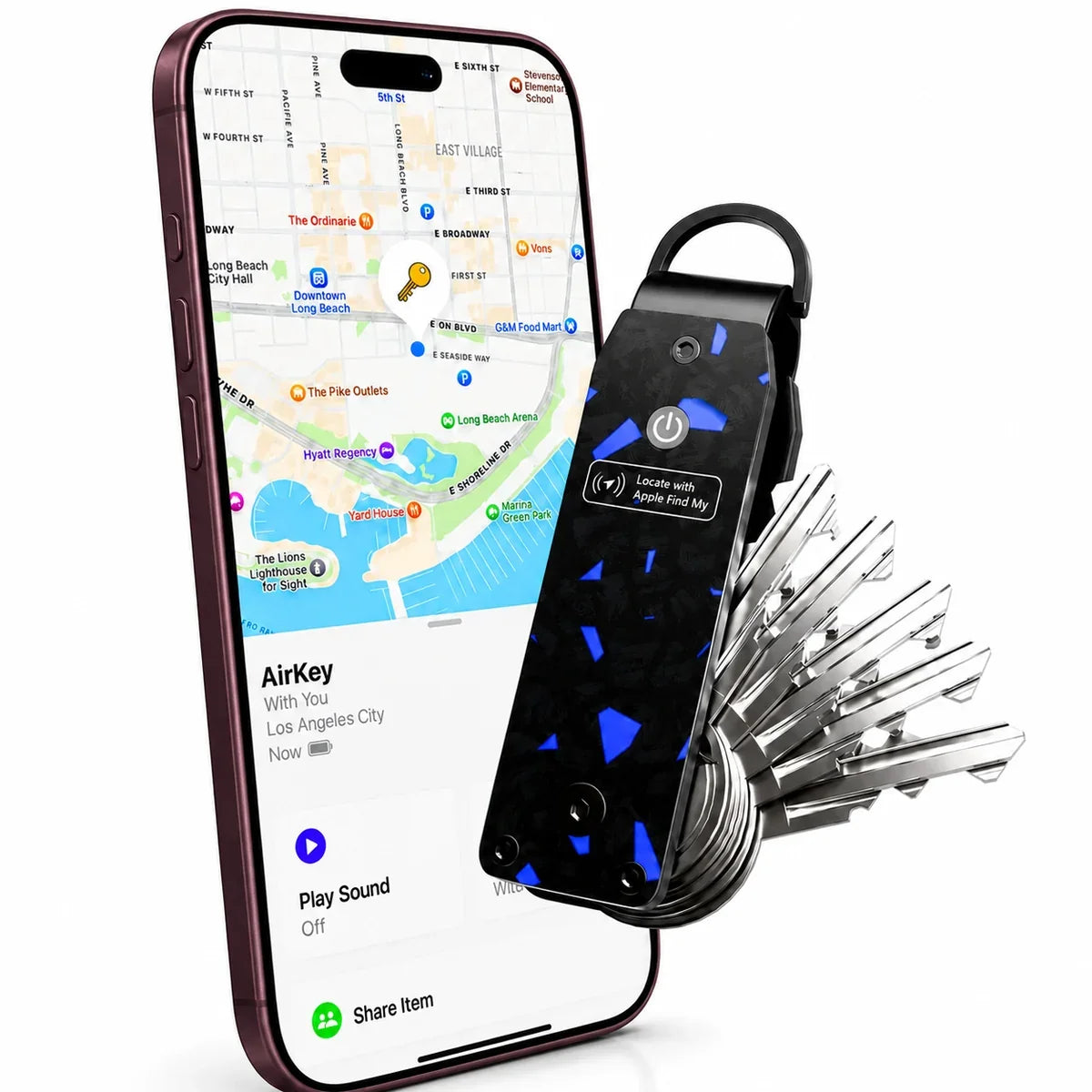 Carbon Blue tracking key organizer beside a Burgundy iPhone showing its location in Find My. #color_Carbon Blue