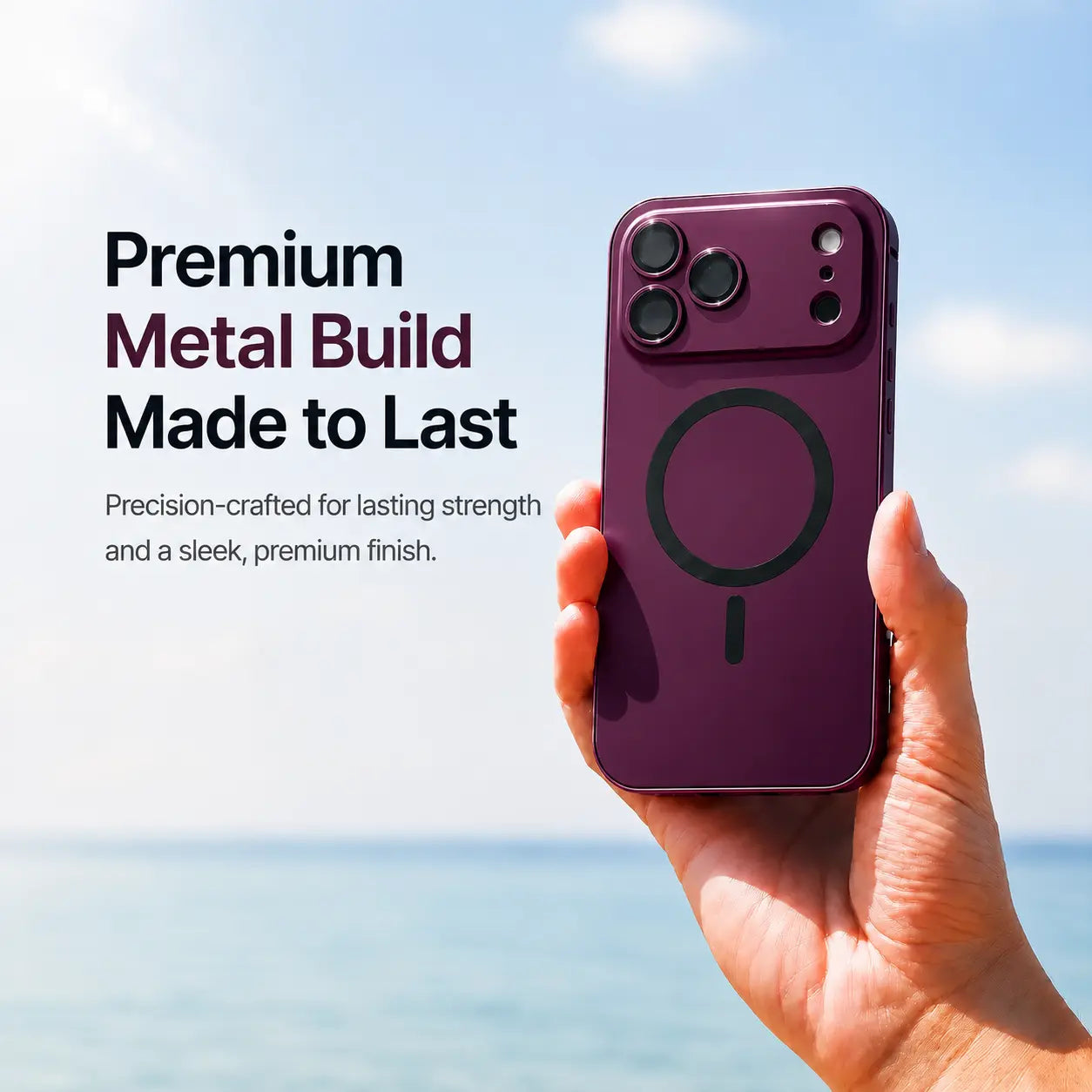 Dark cherry metal magnetic phone case held upright beside the sea with a material feature caption #color_Dark Cherry