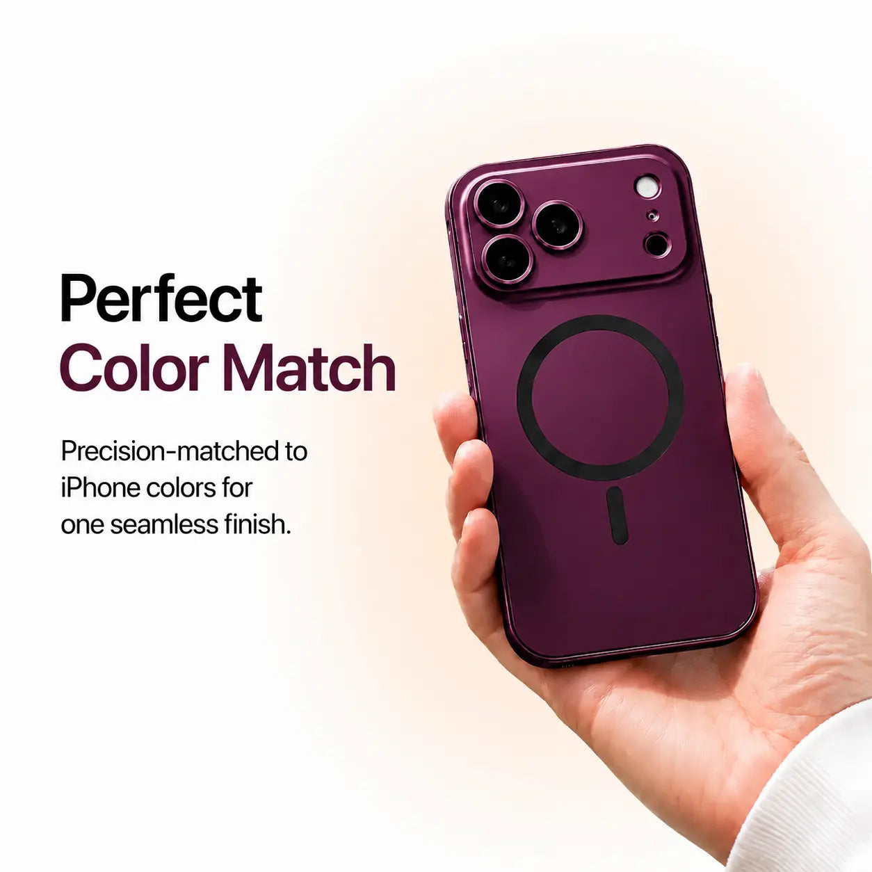 Dark cherry metal magnetic phone case held in one hand against a pale studio background #color_Dark Cherry