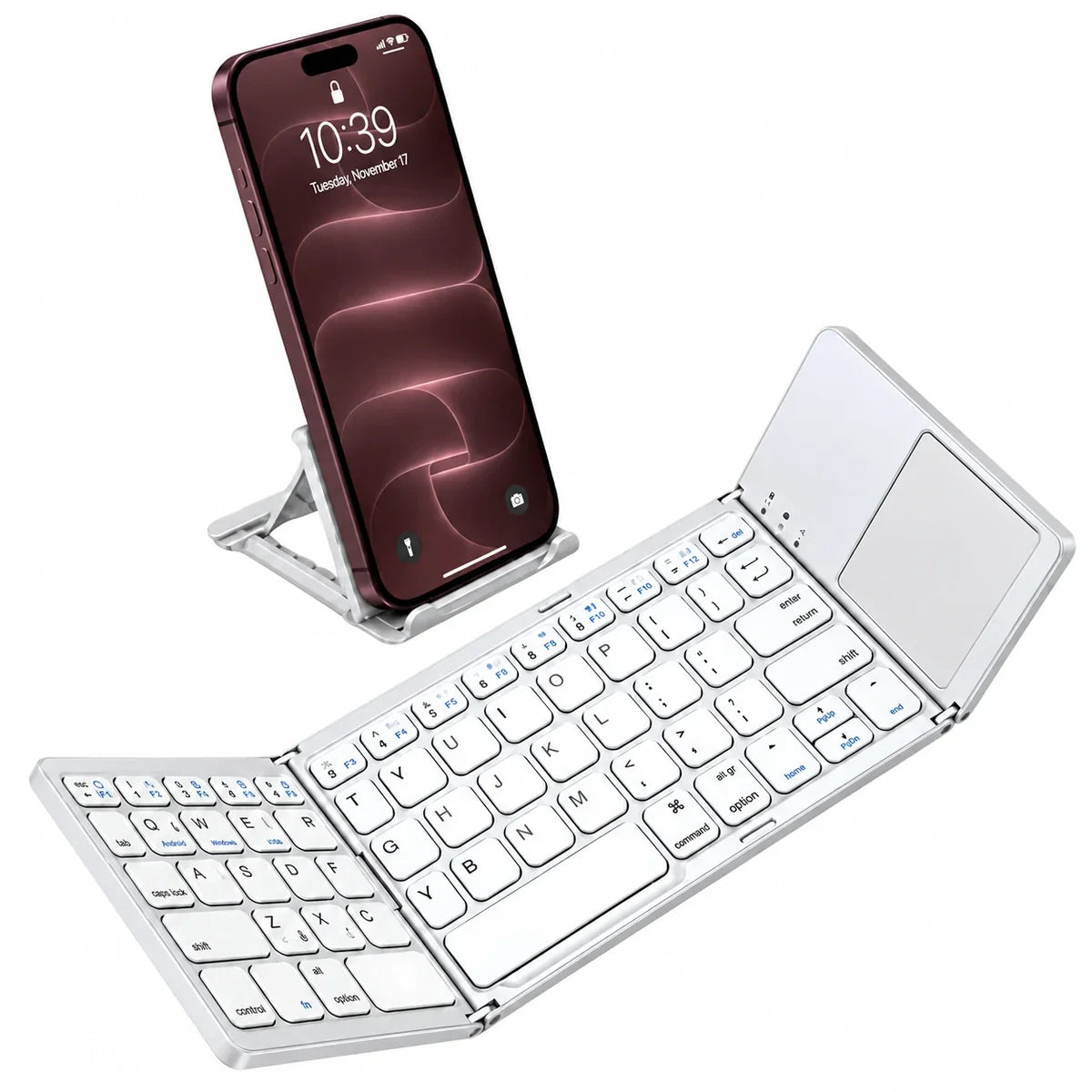Titanium Silver folding Bluetooth keyboard with touchpad beside a Burgundy iPhone on a separate stand. #color_Titanium Silver