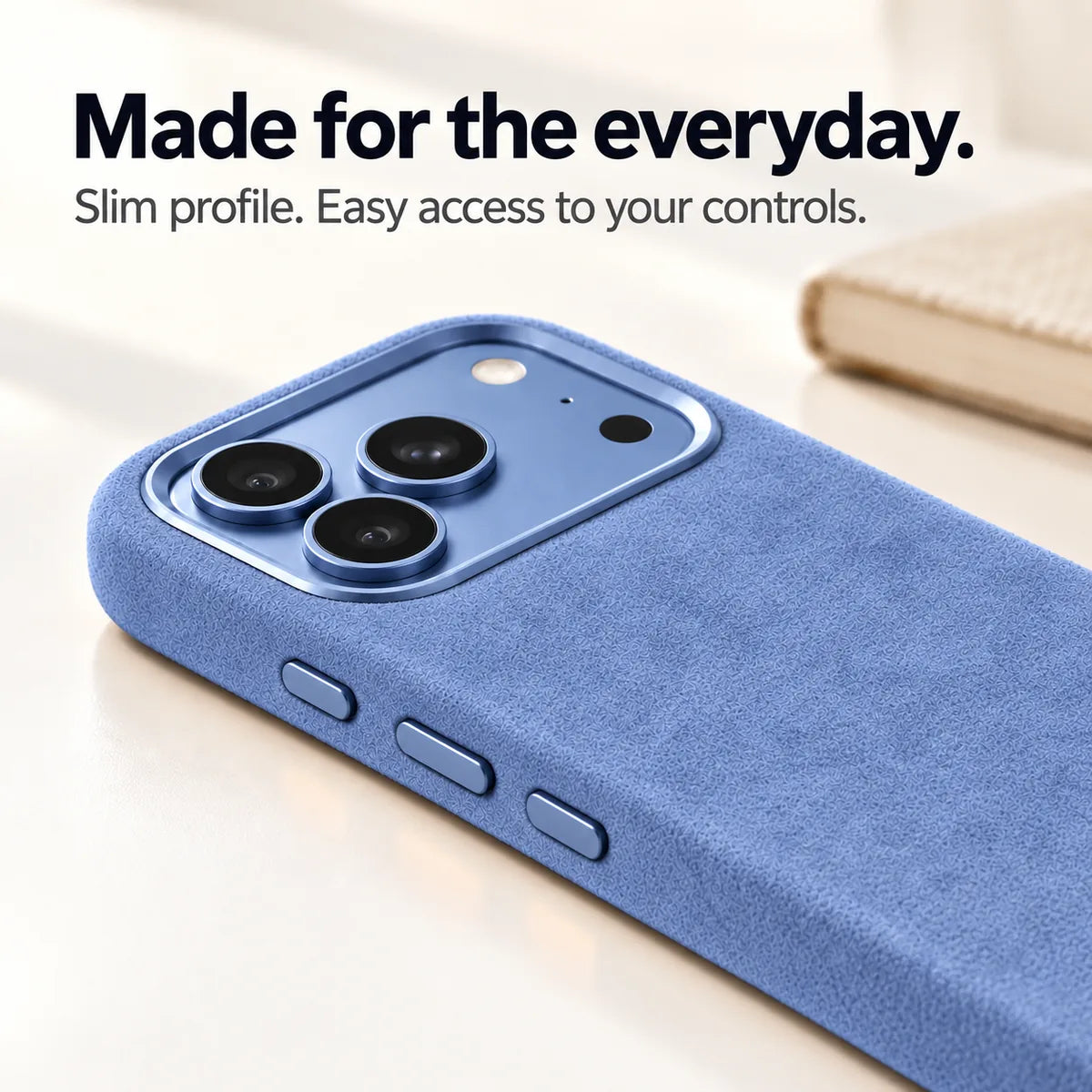 Light blue fabric phone case with a close view of its slim side and controls. #color_Glacier