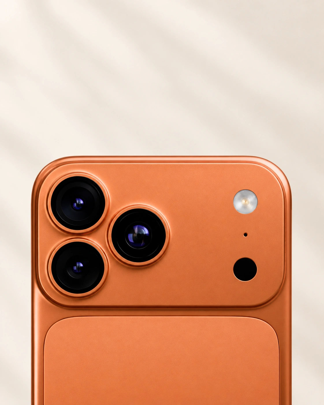 Raised orange backplate camera openings aligned concentrically around three iPhone lenses.