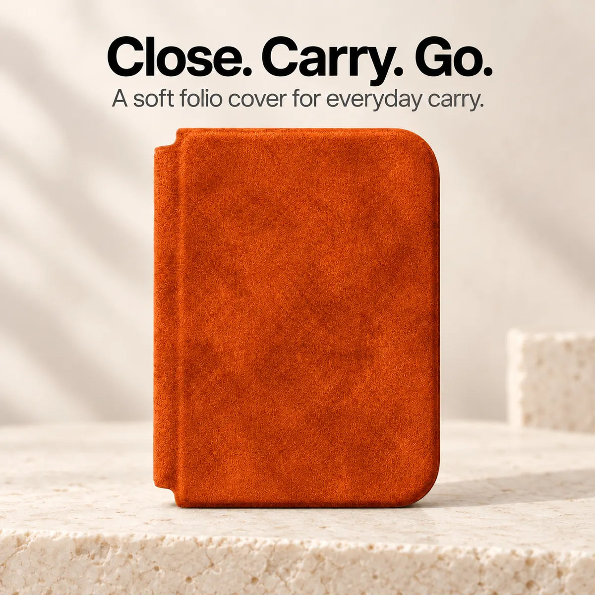 Cosmic Orange Alcantara folio case for iPhone Duo, closed front cover with a soft fabric finish #color_Cosmic Orange