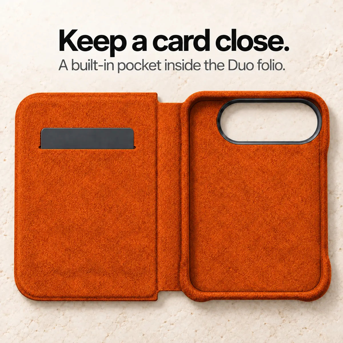 Cosmic Orange Alcantara folio case for iPhone Duo, opened folio showing its built-in card pocket and camera opening #color_Cosmic Orange
