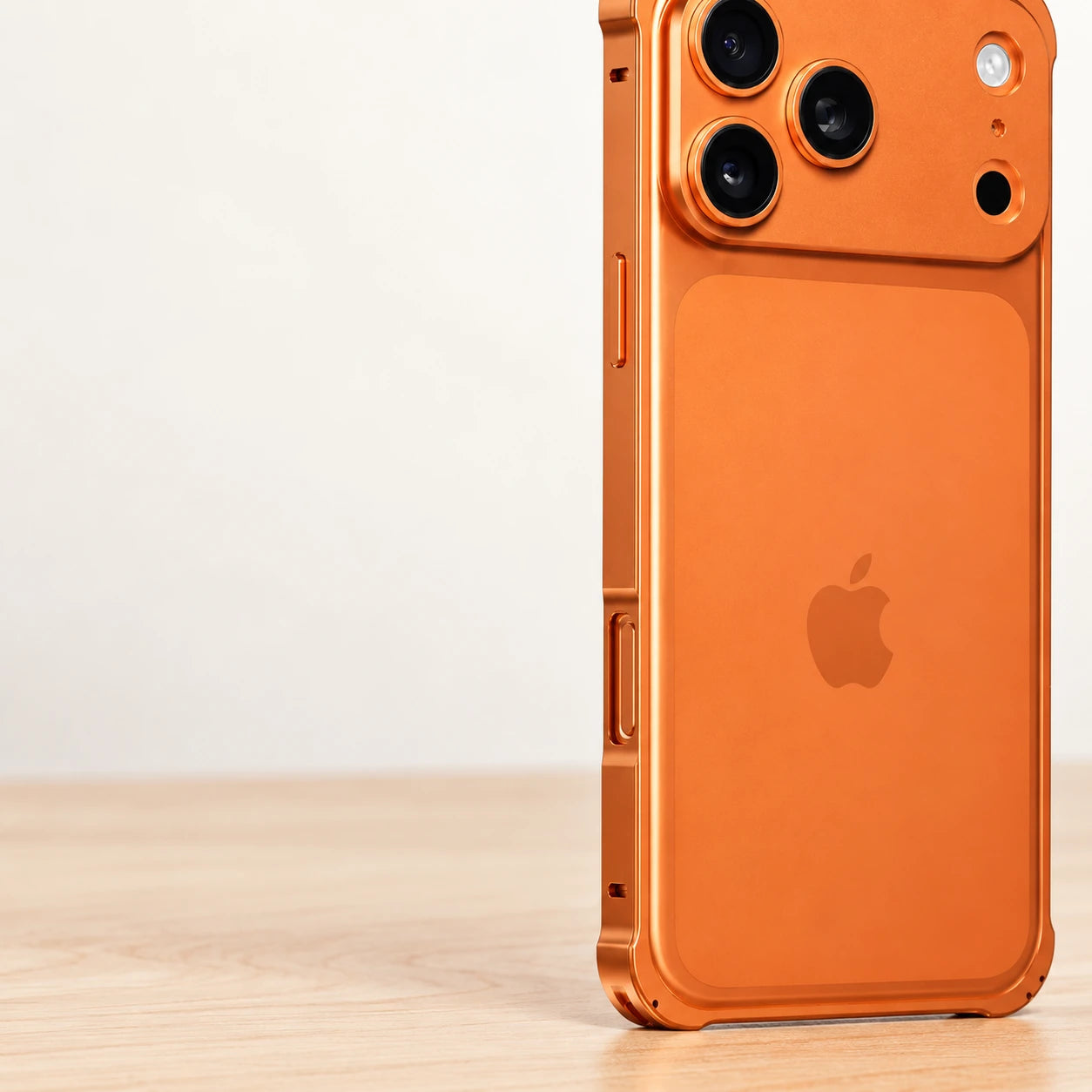 Close-up of the orange aluminum bumper's original straight side rail, button opening and corner fasteners.