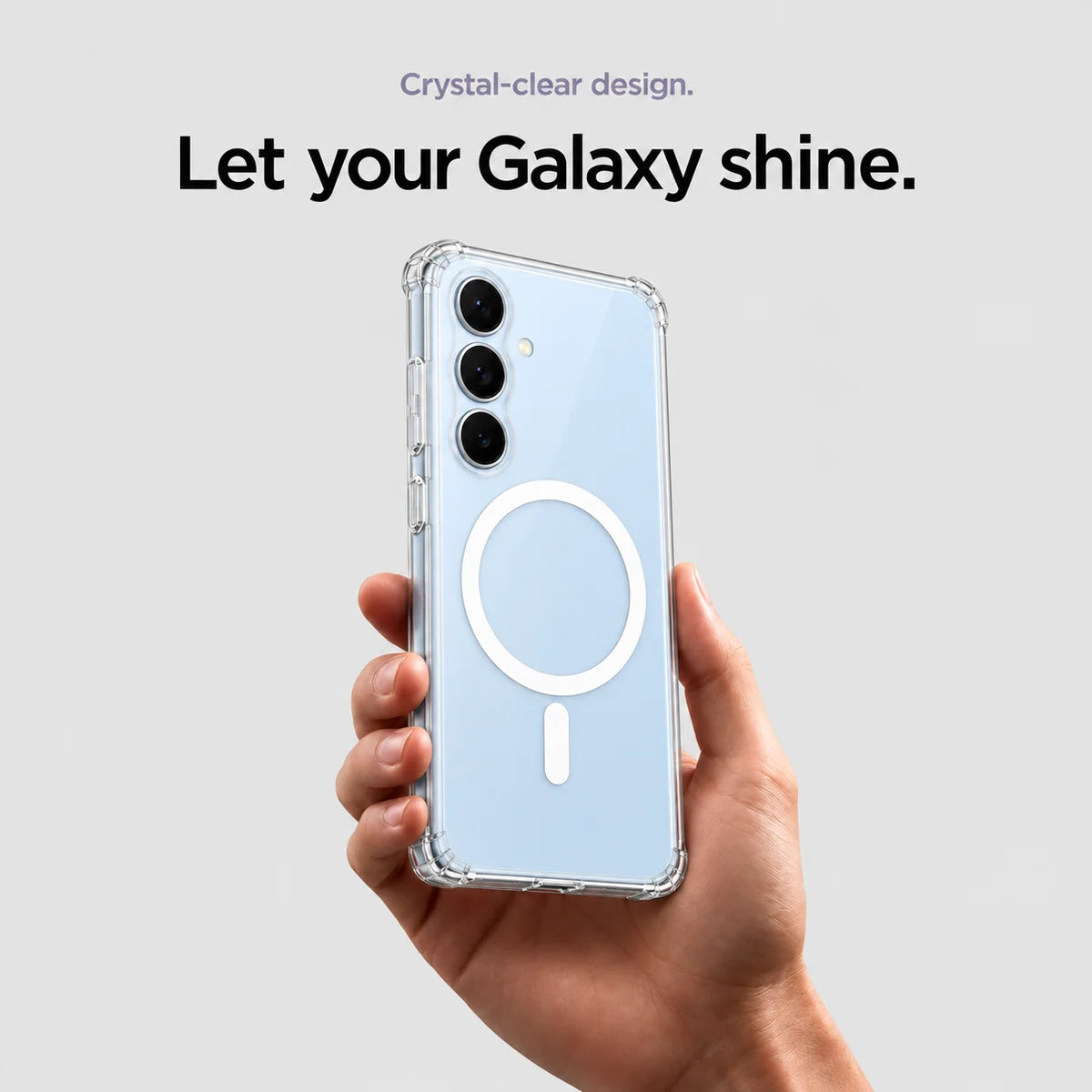 Clear magnetic phone case held at an angle, showing its transparent back and camera openings. #Samsung Model_Samsung S24 FE