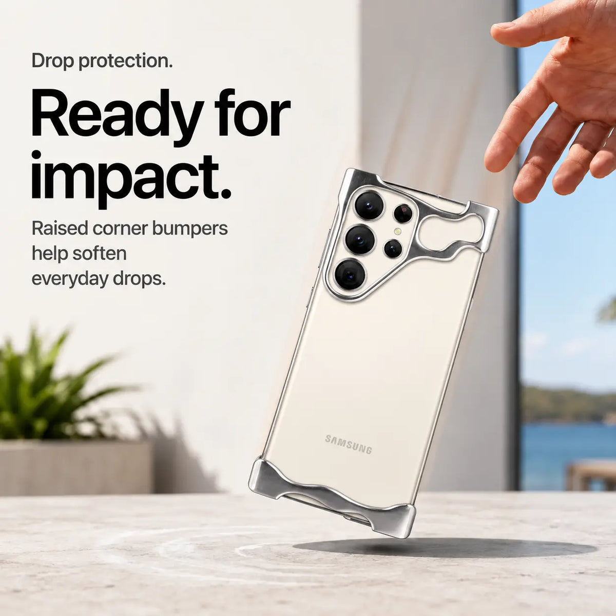 Silver open-edge phone case shown during a corner drop demonstration #color_Silver