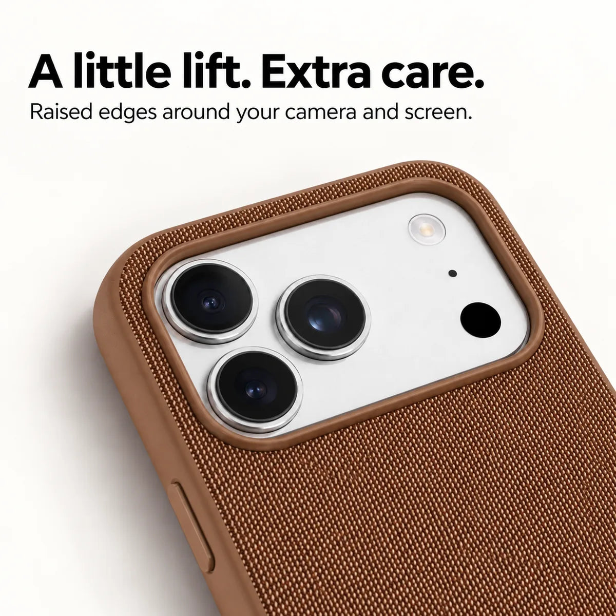 Close view of the raised camera surround and woven fabric on an Umber Brown phone case. #color_Umber Brown